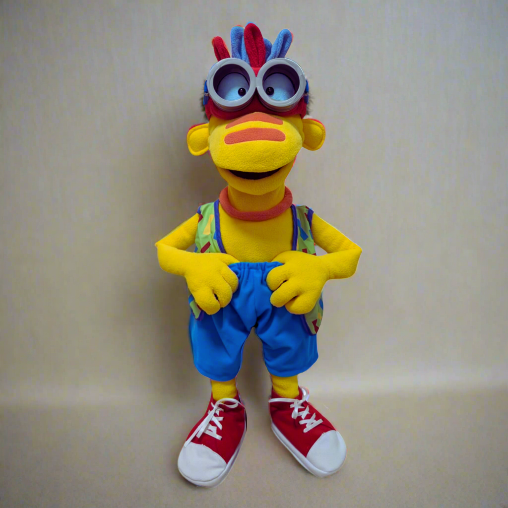 Full-body Zoomer alien hand puppet standing in blue overalls and red high-top sneakers.